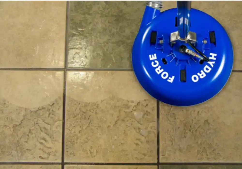 Close-up of eco-friendly cleaning solutions being applied on hard floor in Swansea property